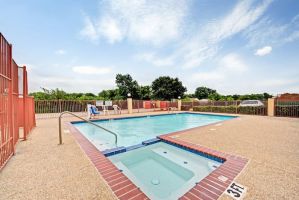 Pool at the Days Inn by Wyndham Dallas South in Dallas, Texas